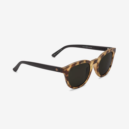 electric bellevue tortoise black sunglass. polarized grey lens. medium sized frame for men and women. side angle view